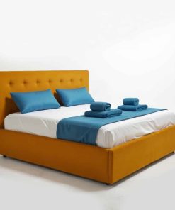 Pat tapițat Karl Mosen cu somieră rabatabilă, ladă de depozitare și saltea – culoare muștar